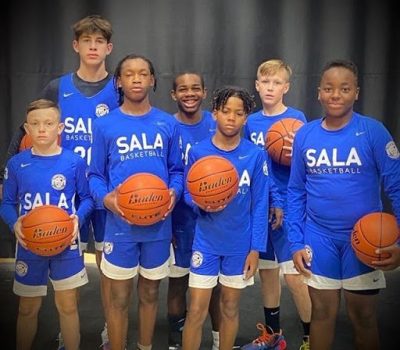SALA basketball players pose for a photo.
